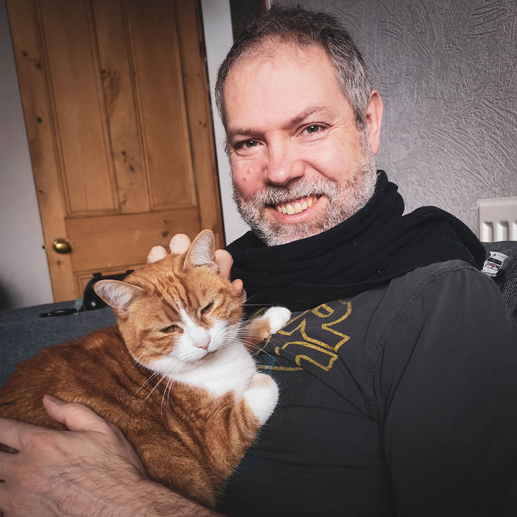 Photograph of me with one of my cats